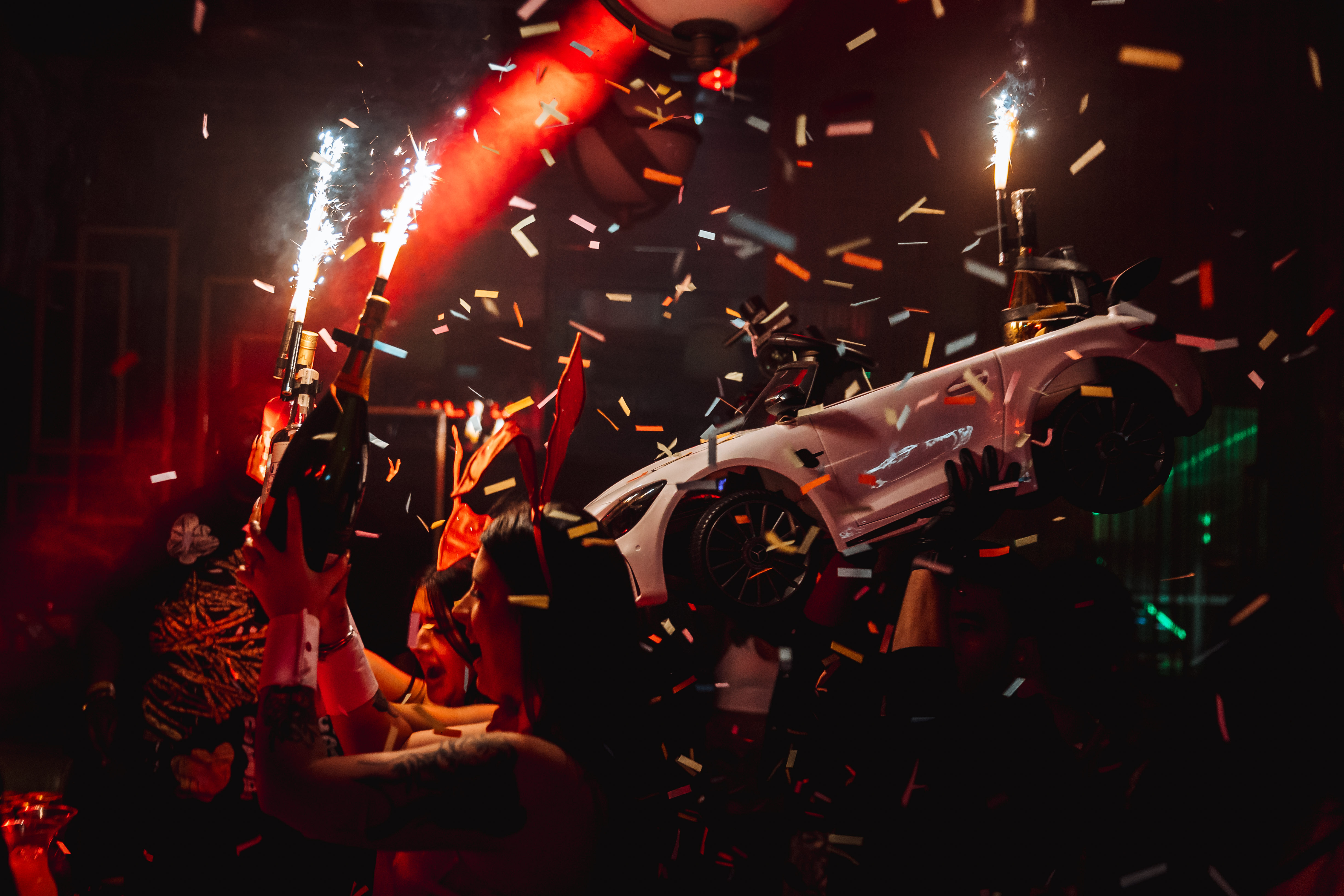 A Manchester celebration beneath confetti and sparklers